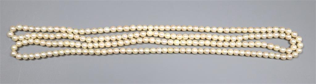 A single strand cultured pearl necklace, 127cm and a coral fragment and cultured pearl necklace, 80cm.